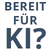 Button mit der Aufschrift Bereit für KI? auf grauem Hintergrund.